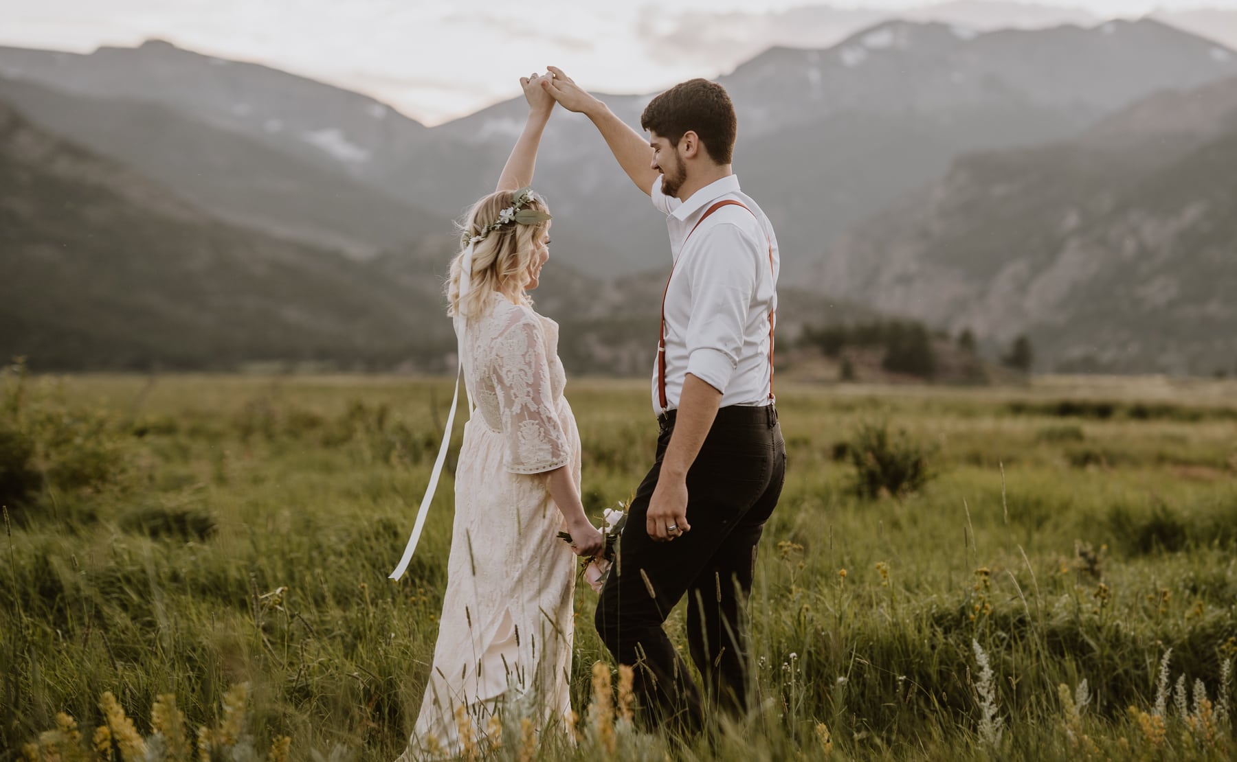 Bride and groom share a first dance in Moraine Meadows or Rocky Mountain National Park