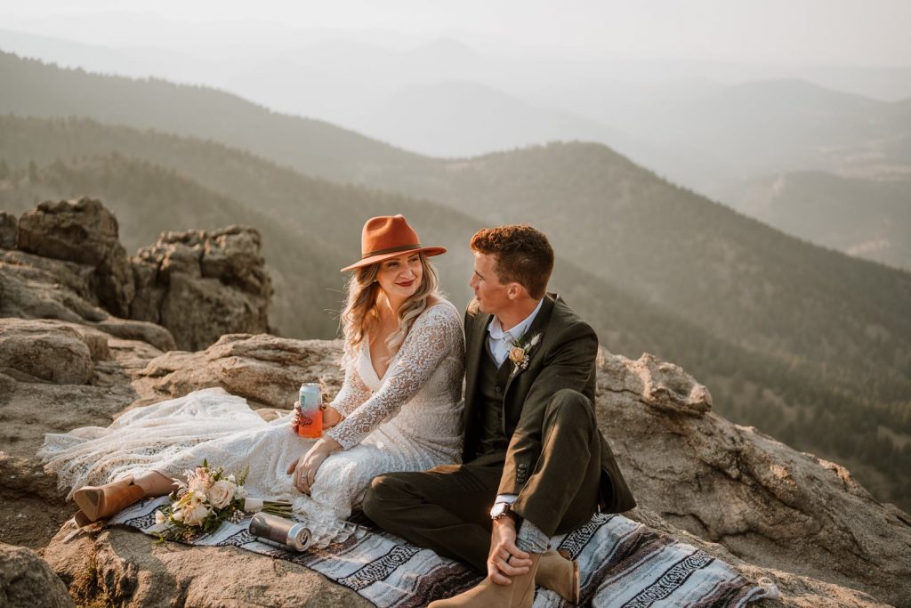 Bride and groom enjoy their sunrise celebration after getting married in Colorado! They followed my ultimate step-by-step guide on how to plan an elopement.
