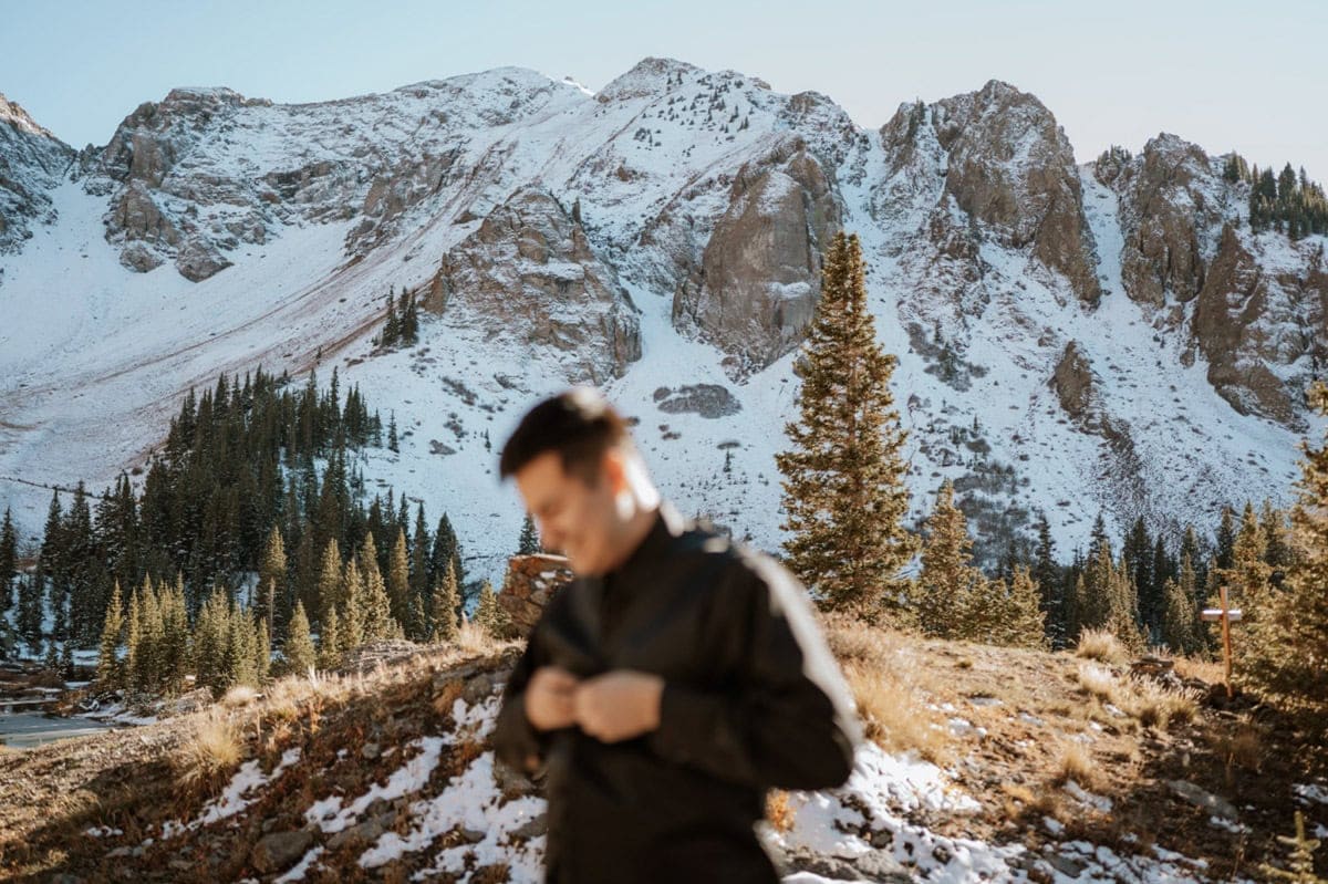 Getting ready moment before a Telluride elopement in the San Juan Mountains.